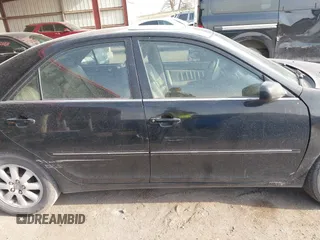 2003 Toyota Camry LE with VIN 4T1BE32K33U176270, listed as a IAAI auction lot 41995146 with 223,032 mi miles and . Bid and sale history available at DreamBid. Image 14.