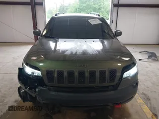 2020 Jeep Cherokee Trailhawk Elite with VIN 1C4PJMBN2LD538076, listed as a IAAI auction lot 42219282 with 53,773 mi miles and . Bid and sale history available at DreamBid. Image 12.