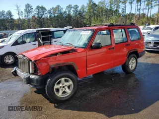 1999 Jeep Cherokee SE with VIN 1J4FT28S6XL515896, listed as a Copart auction lot 83745444 with 192,406 mi miles and Salvage title. Bid and sale history available at DreamBid. Image 1.