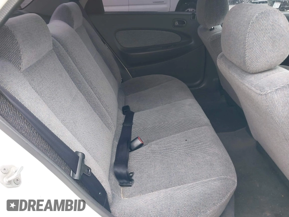 1997 Mazda Protege DX with VIN JM1BC1417V0156858, listed as a IAAI auction lot 42118339 with 187,673 mi miles and . Bid and sale history available at DreamBid. Image 8.