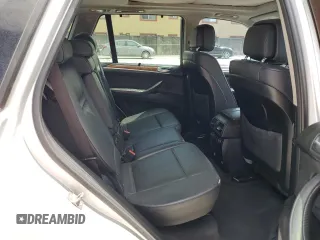 2013 BMW X5 xDrive35i z VIN 5UXZV4C5XD0B03182, wystawiony jako Copart lot #54906305 z przebiegiem 166 493 mil mil oraz Szkody całkowita. Historia ofert i sprzedaży dostępna na DreamBid. Obrazek 11.