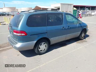 2001 Toyota Sienna LE with VIN 4T3ZF13C41U387019, listed as a IAAI auction lot 42540086 with 118,682 mi miles and . Bid and sale history available at DreamBid. Image 4.