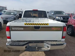 1998 Nissan Frontier XE z VIN 1N6DD26S7WC389105, wystawiony jako IAAI lot #42054733 z przebiegiem 164 453 mil mil oraz . Historia ofert i sprzedaży dostępna na DreamBid. Obrazek 17.