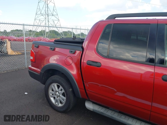 2007 Ford Explorer Sport Trac XLT with VIN 1FMEU31K47UA56890, listed as a IAAI auction lot 42566342 with 210,900 mi miles and . Bid and sale history available at DreamBid. Image 4.