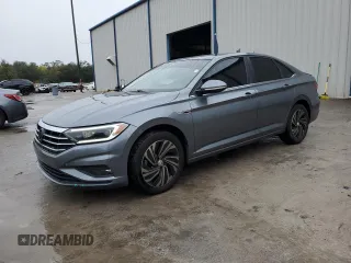 2019 Volkswagen Jetta SEL Premium с VIN 3VWGB7BU8KM201806, выставлен на аукционе Copart как лот 88099975 с пробегом 18 530 миль миль и Списание • Salvage title. История ставок и продаж доступна на DreamBid. Изображение 1.