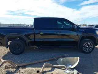 2021 GMC Sierra 1500 AT4 with VIN 1GTU9EETXMZ230606, listed as a IAAI auction lot 41599778 with 128,745 mi miles. Bid and sale history available at carsss.com. Image 14.