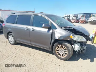 2012 Toyota Sienna XLE AAS with VIN 5TDYK3DC1CS186331, listed as a IAAI auction lot 41545031 with 240,788 mi miles and . Bid and sale history available at DreamBid. Image 1.