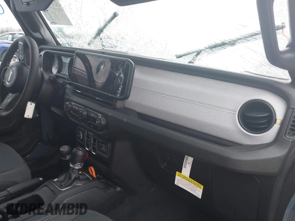 2024 Jeep Gladiator Sport z VIN 1C6HJTAG5RL127973, wystawiony jako IAAI lot #41248039 z przebiegiem 2 648 mil mil oraz . Historia ofert i sprzedaży dostępna na DreamBid. Obrazek 5.