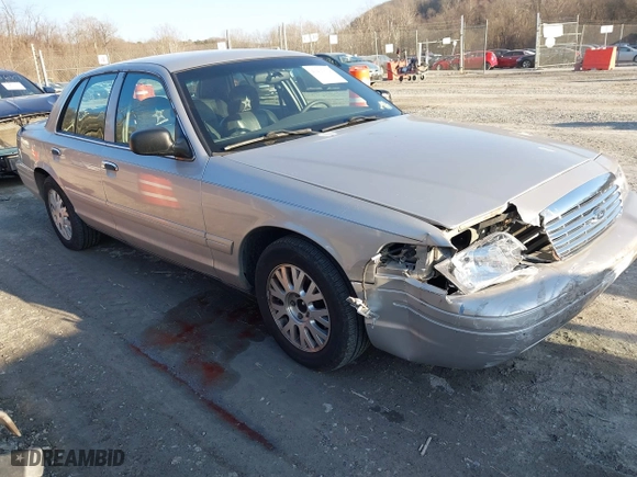 2005 Ford Crown Victoria LX with VIN 2FAFP74W85X121984, listed as a IAAI auction lot 41427678 with 113,437 mi miles. Bid and sale history available at carsss.com. Image 1.
