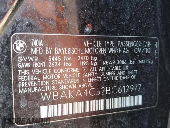 2011 BMW 7 Series 740i with VIN WBAKA4C52BC612977, listed as a Copart auction lot 52582575 with 157,813 mi miles and Salvage Title. Bid and sale history available at carsss.com. Image 12.