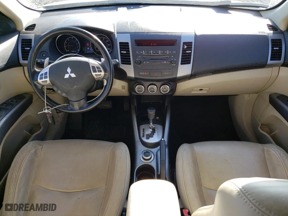 2010 Mitsubishi Outlander XLS with VIN JA4JT4AX8AZ006392, listed as a Copart auction lot 50663555 with 104,172 mi miles and Salvage Title. Bid and sale history available at carsss.com. Image 8.