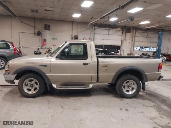 1999 Ford Ranger XLT with VIN 1FTYR11X0XTA72917, listed as a IAAI auction lot 41502156 with 106,585 mi miles. Bid and sale history available at carsss.com. Image 12.