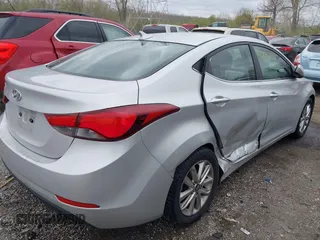 2015 Hyundai Elantra SE with VIN 5NPDH4AEXFH599545, listed as a IAAI auction lot 42017312 with 151,453 mi miles and . Bid and sale history available at DreamBid. Image 6.