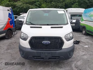 2021 Ford Transit Cargo with VIN 1FTBR1Y83MKA76305, listed as a IAAI auction lot 42240276 with 75,256 mi miles and . Bid and sale history available at DreamBid. Image 12.