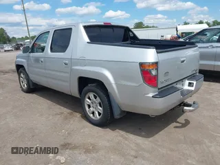 2006 Honda Ridgeline RTL with VIN 2HJYK16566H550339, listed as a IAAI auction lot 42223323 with 240,372 mi miles and . Bid and sale history available at DreamBid. Image 3.