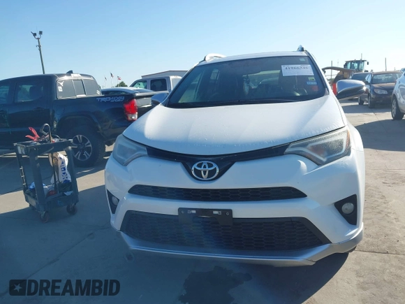 2016 Toyota RAV4 SE with VIN JTMNFREV9GJ069030, listed as a IAAI auction lot 41966346 with 168,417 mi miles and . Bid and sale history available at DreamBid. Image 12.