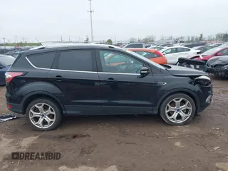 2017 Ford Escape Titanium with VIN 1FMCU0J95HUD37858, listed as a IAAI auction lot 41984629 with 87,163 mi miles and . Bid and sale history available at DreamBid. Image 12.