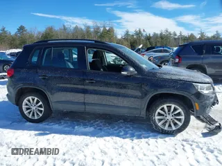 2017 Volkswagen Tiguan S with VIN WVGBV7AX7HK049500, listed as a IAAI auction lot 41632573 with 83,362 mi miles and . Bid and sale history available at DreamBid. Image 13.