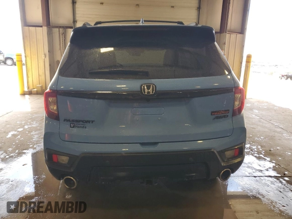 2024 Honda Passport TrailSport z VIN 5FNYF8H61RB013217, wystawiony jako Copart lot #52349015 z przebiegiem 8 360 mil mil oraz Szkoda całkowita • Salvage title. Historia ofert i sprzedaży dostępna na DreamBid. Obrazek 6.