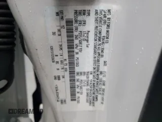 2016 Ford Focus Electric z VIN 1FADP3R42GL234563, wystawiony jako Copart lot #43955695 z przebiegiem 66 636 mil mil oraz Szkoda całkowita • Salvage title. Historia ofert i sprzedaży dostępna na DreamBid. Obrazek 14.