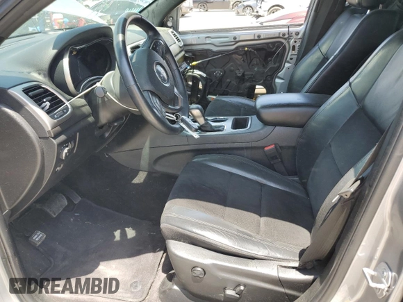 2018 Jeep Grand Cherokee Laredo with VIN 1C4RJFAG4JC272683, listed as a Copart auction lot 56823455 with 122,778 mi miles and Salvage title. Bid and sale history available at DreamBid. Image 7.