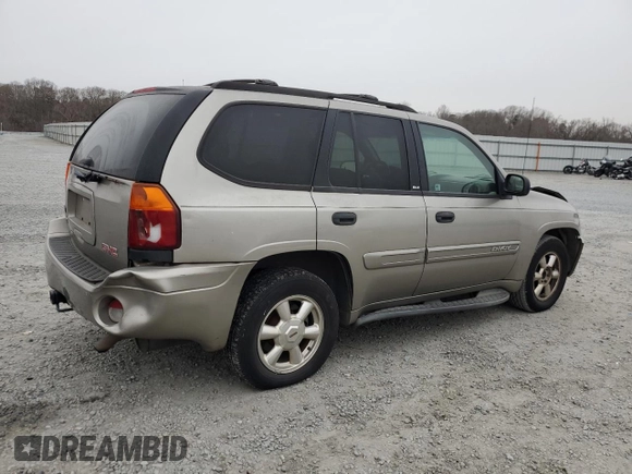 2003 GMC Envoy SLE with VIN 1GKDS13SX32386924, listed as a Copart auction lot 41778545 with 202,006 mi miles and Salvage Title. Bid and sale history available at carsss.com. Image 3.