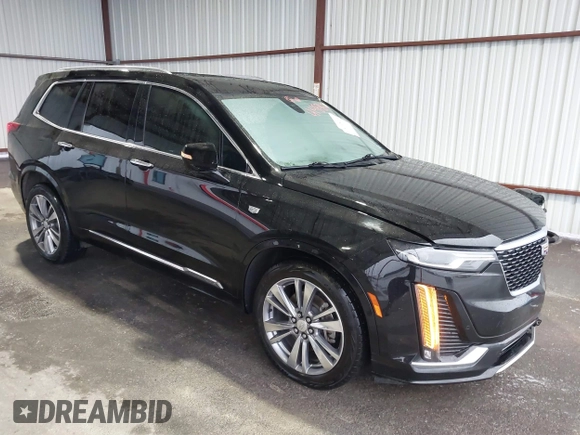 2020 Cadillac XT6 FWD Premium Luxury with VIN 1GYKPCRS9LZ177120, listed as a IAAI auction lot 41608960 with 63,109 mi miles and . Bid and sale history available at DreamBid. Image 1.