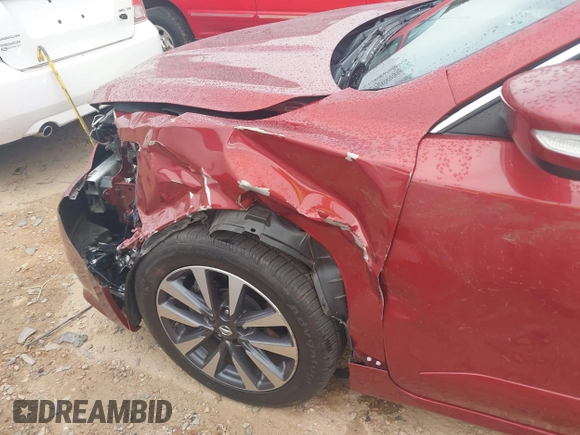 2016 Nissan Altima SV with VIN 1N4AL3AP6GC287139, listed as a IAAI auction lot 40699745 with 54,675 mi miles and . Bid and sale history available at DreamBid. Image 14.