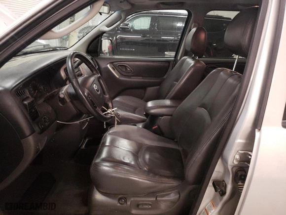 2003 Mazda Tribute ES with VIN 4F2CZ96173KM04753, listed as a Copart auction lot 76811034 with 96,351 mi miles and Clean Title. Bid and sale history available at carsss.com. Image 7.
