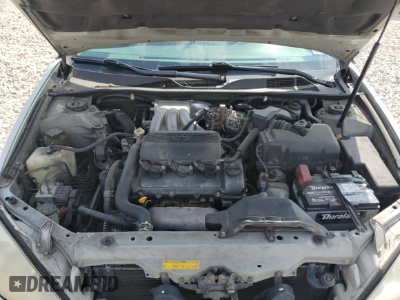 2002 Toyota Camry XLE z VIN 4T1BF32K12U519069, wystawiony jako Copart lot #55501405 z przebiegiem 186 142 mil mil oraz Szkoda całkowita • Salvage title. Historia ofert i sprzedaży dostępna na DreamBid. Obrazek 11.