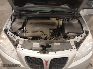 2009 Pontiac G6 w/1SA *Ltd Avail* with VIN 1G2ZG57B094155004, listed as a IAAI auction lot 41925584 with 123,169 mi miles. Bid and sale history available at carsss.com. Image 10.
