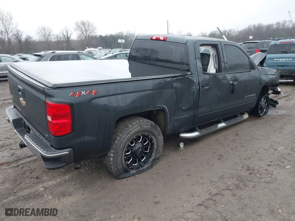 2018 Chevrolet Silverado 1500 LT with VIN 1GCVKREC4JZ141125, listed as a IAAI auction lot 41474345 with 198,197 mi miles. Bid and sale history available at carsss.com. Image 4.