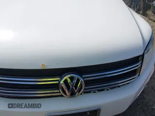 2012 Volkswagen Tiguan S with VIN WVGBV7AX0CW582922, listed as a IAAI auction lot 41906974 with 150,681 mi miles and . Bid and sale history available at DreamBid. Image 10.