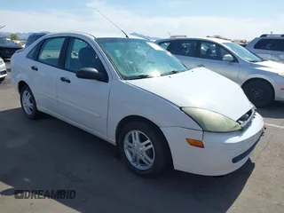 2004 Ford Focus SE z VIN 1FAFP34Z44W103852, wystawiony jako IAAI lot #42395073 z przebiegiem Nie podano mil oraz . Historia ofert i sprzedaży dostępna na DreamBid. Obrazek 1.