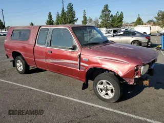 1997 Mazda B-Series 2WD Truck LE with VIN 4F4CR16X7VTM32921, listed as a Copart auction lot 89019835 with 156,928 mi miles and Clean Title. Bid and sale history available at carsss.com. Image 4.