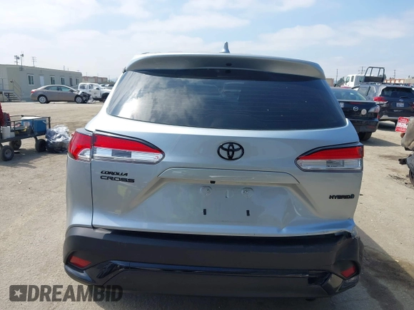 2023 Toyota Corolla Cross Hybrid S with VIN 7MUFBABG1PV014992, listed as a IAAI auction lot 42202656 with 18,913 mi miles and . Bid and sale history available at DreamBid. Image 16.