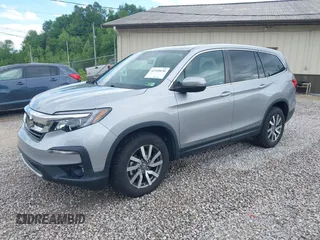 2021 Honda Pilot EX-L with VIN 5FNYF6H50MB063465, listed as a IAAI auction lot 42160636 with 28,595 mi miles and . Bid and sale history available at DreamBid. Image 17.