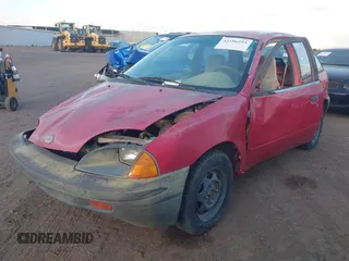 1996 Chevrolet Metro with VIN 2C1MR2269T6774342, listed as a IAAI auction lot 42196255 with 142,330 mi miles and . Bid and sale history available at DreamBid. Image 2.