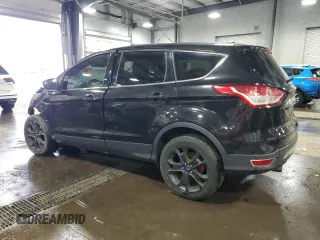 2013 Ford Escape SEL with VIN 1FMCU9H91DUA79911, listed as a Copart auction lot 54265415 with 162,705 mi miles and Salvage title. Bid and sale history available at DreamBid. Image 2.
