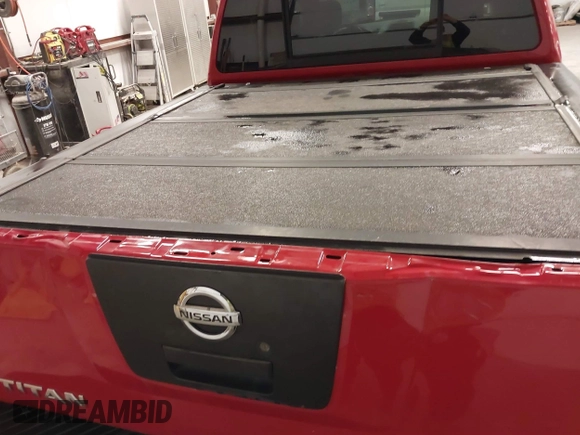 2012 Nissan Titan SV with VIN 1N6AA0EC7CN327973, listed as a IAAI auction lot 41841596 with 148,519 mi miles. Bid and sale history available at carsss.com. Image 17.