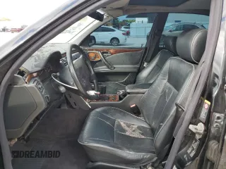2001 Mercedes-Benz E-Class with VIN WDBJF70J51B372314, listed as a Copart auction lot 81494124 with 180,736 mi miles and Salvage Title. Bid and sale history available at carsss.com. Image 7.