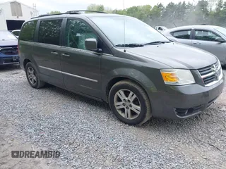 2010 Dodge Grand Caravan SXT z VIN 2D4RN5DX0AR355385, wystawiony jako IAAI lot #42331965 z przebiegiem 133 402 mil mil oraz . Historia ofert i sprzedaży dostępna na DreamBid. Obrazek 1.