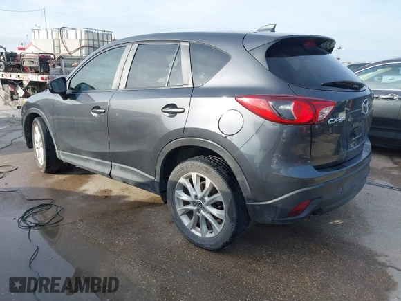 2014 Mazda CX-5 Grand Touring with VIN JM3KE2DY7E0345742, listed as a IAAI auction lot 41864116 with 158,746 mi miles. Bid and sale history available at carsss.com. Image 3.