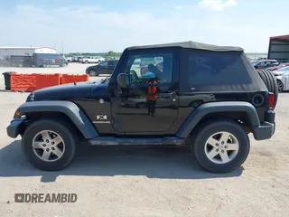 2007 Jeep Wrangler X с VIN 1J4FA24187L160975, выставлен на аукционе IAAI как лот 42488101 с пробегом 124 489 миль миль и . История ставок и продаж доступна на DreamBid. Изображение 14.