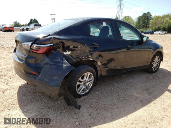 2018 Toyota Yaris with VIN 3MYDLBYV0JY326720, listed as a Copart auction lot 52027505 with 105,127 mi miles and Salvage Title. Bid and sale history available at DreamBid. Image 3.