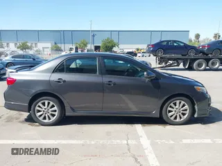 2009 Toyota Corolla with VIN 1NXBU40E19Z143959, listed as a IAAI auction lot 42032312 with 155,776 mi miles. Bid and sale history available at carsss.com. Image 13.