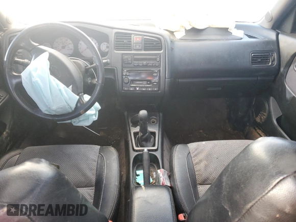 2002 Infiniti G20 Luxury with VIN JNKCP11A02T512055, listed as a Copart auction lot 42599045 with 160,649 mi miles and Salvage Title. Bid and sale history available at DreamBid. Image 8.
