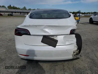 2021 Tesla Model 3 Long Range with VIN 5YJ3E1EB7MF874304, listed as a Copart auction lot 52652825 with Not Provided miles and Salvage Title. Bid and sale history available at carsss.com. Image 6.