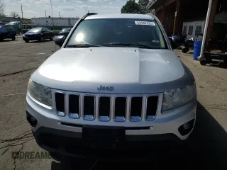 2011 Jeep Compass Latitude with VIN 1J4NF1FB6BD263831, listed as a Copart auction lot 52542625 with 160,743 mi miles and Salvage Title. Bid and sale history available at DreamBid. Image 5.