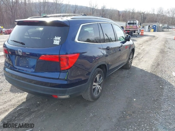 2017 Honda Pilot EX-L with VIN 5FNYF5H52HB031634, listed as a IAAI auction lot 41145133 with 164,668 mi miles. Bid and sale history available at carsss.com. Image 4.